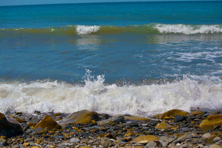 sea rocky coast on a sunny summer dayの写真素材