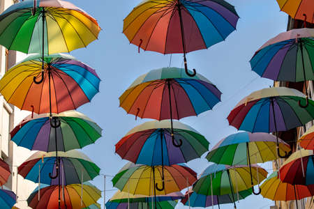 colorful umbrellas in the clouds as the main backgroundの写真素材