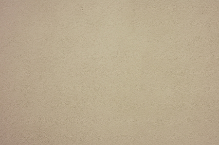 Yellow plaster wall background の写真素材