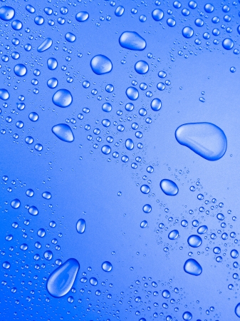blue background of beautiful water drops の写真素材
