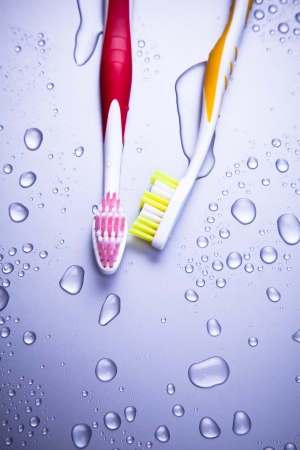 Two tooth-brushes and water dropsの写真素材