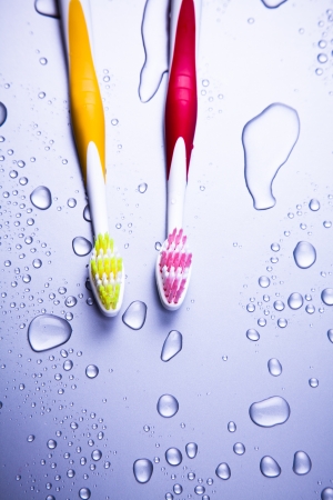 Two tooth-brushes and water dropsの写真素材