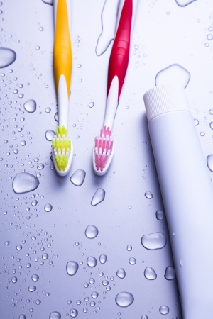 Two tooth-brushes and water dropsの写真素材