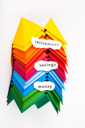 Colourful origami figures with signs money, retirement, savingsの写真素材