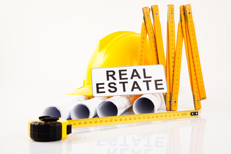 architectural project  yellow hardhat and measure の写真素材