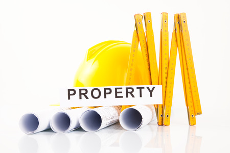 architectural project  yellow hardhat and measure の写真素材
