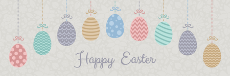 Happy Easter - colourful header with hanging hand drawn eggs and greeting. Vector.のイラスト素材