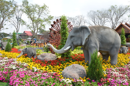 flowers garden  with elephant statueの写真素材