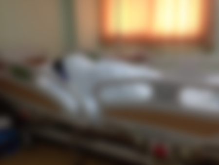 blur   female patient sleep on bed in hospital roomの写真素材