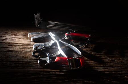 Craftsman tool on wood background-image.