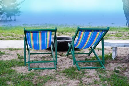 Empty deck chair at the beach during a summer vacation in Thailand â imageの写真素材