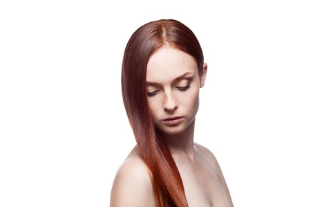 portrait of young famale with long natural red hairの写真素材