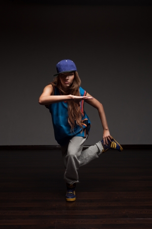 young caucasian hip-hop dancer woman showing some movesの写真素材