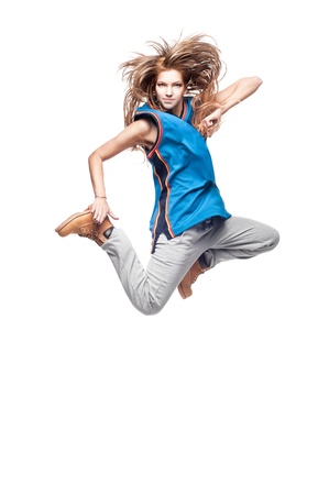 young caucasian hip-hop dancer woman showing some jumpsの写真素材