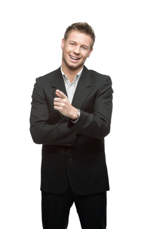 portrait of young smiling successful caucasian businessman in black suit isoalted on whiteの写真素材