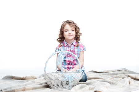 happy smiling little girl holding basket