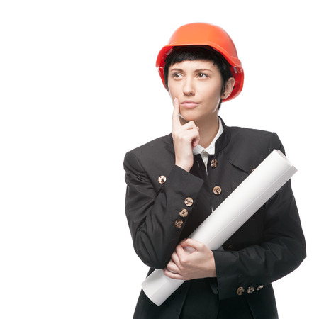 thoughtful engineer woman in construction helmet holding sign. isolated on whiteの写真素材