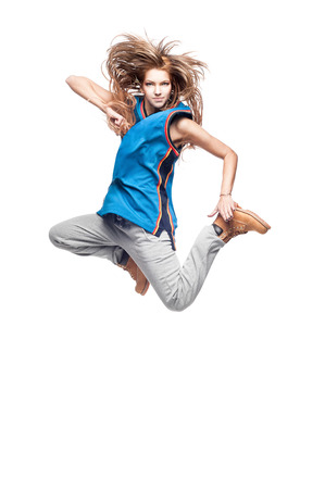 young caucasian hip-hop dancer woman showing some jumpsの写真素材