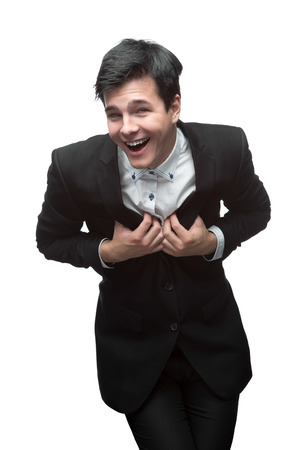 laughing caucasian brunette businessman isolated on white backgroundの写真素材