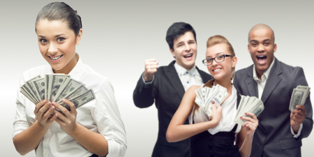 team of young successful business people standing over gray backgroundの写真素材