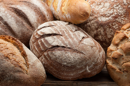 Bread arranged on wooden table . food concept.