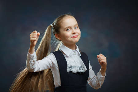 Smart School Girl in Uniform Closeup Portrait