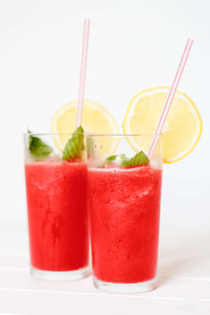 Watermelon smoothies with lemon and mint in glassesの写真素材