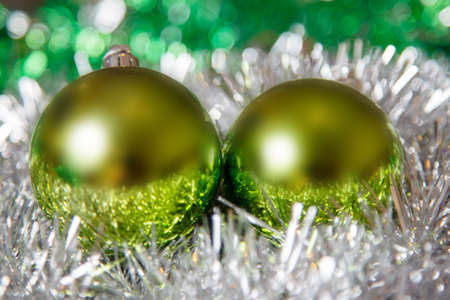 Christmas decoration with white metallic tinsel and balls.の写真素材