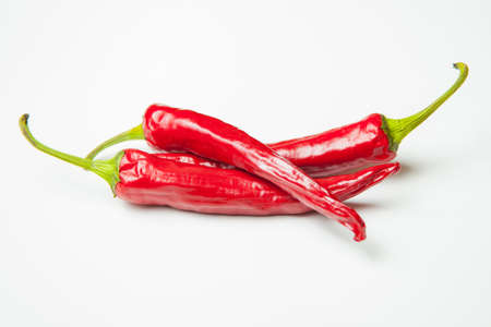 red peppers on a white background