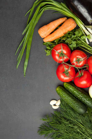 Various vegetables on a wooden dark table with copy spaceの写真素材