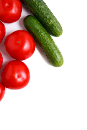 Fresh vegetables isolated on a white background. tomato and cucumber. close upの写真素材