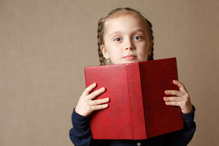 cute little with book. Back to schoolの写真素材