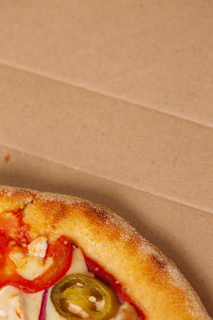 Pizza in a cardboard box. top viewの写真素材