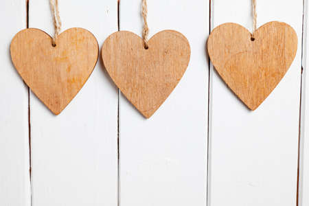 wooden heart on wooden background. love concept. background for greetings Valentine's dayの写真素材