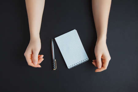 Business work place with hands, top viewの写真素材