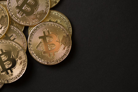Bitcoin gold coin on dark background. Virtual cryptocurrency concept.の写真素材