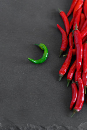 Chili peppers on a black backgroundの写真素材