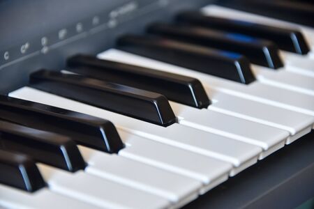Electronic musical keyboard synthesizer close-up. Piano keysの写真素材