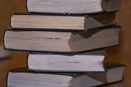 stack of old books on the table side view. closeupの写真素材