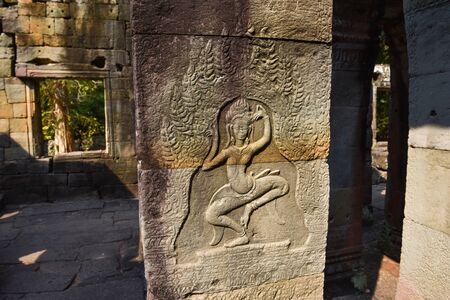 bas-relief sculpture dancing apsara at Angkor Wat, Siem Reap, Cambodia.の写真素材