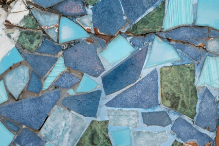 Colorful ceramic mosaic floor or wall. mosaic top view. Bathroom or kitchen floor wall design idea. Reused broken tile. Interior design. Colored eastern pottery.の写真素材