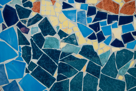 Colorful ceramic mosaic floor or wall. mosaic top view. Bathroom or kitchen floor wall design idea. Reused broken tile. Interior design. Colored eastern pottery.の写真素材
