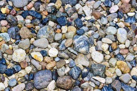 Flat lay of sea stones texture background. Abstract shape pattern from natureの写真素材
