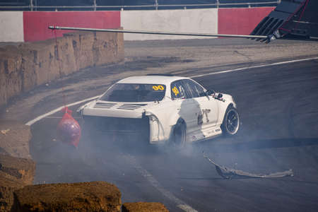 VLADIVOSTOK, RUSSIA - OCTOBER 02: Car accident on the race track. Russian drift show RDS without borders on October 02, 2021.のeditorial素材