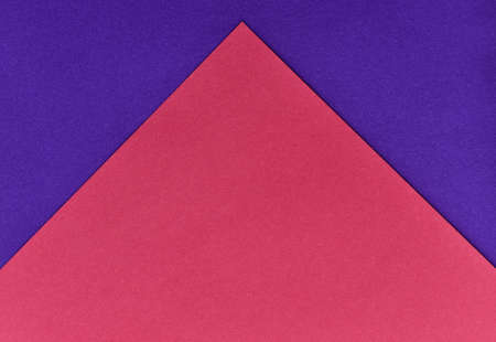 abstract geometric paper background. violet and red trendy colors. The backdrop for an invitation card, greeting card or web design. Creative copy space, flat lay.の写真素材
