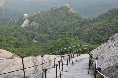 Stairs to climb a mountain in Bukhansan National Park, Seoul, South Korea.の写真素材