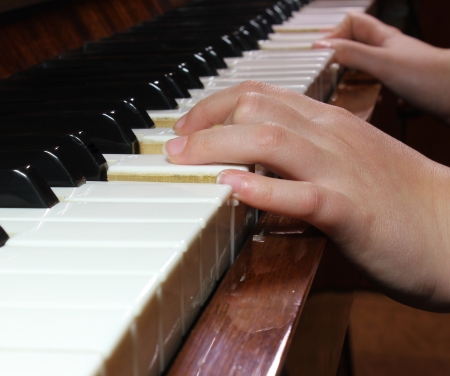 hand on piano keysの写真素材