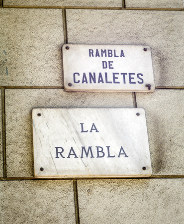 Barcelona landmark - La Rambla street sign in wal, Spain.の写真素材