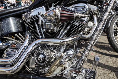 BARCELONA, SPAIN - JULY 04, 2015: Unidentified persons with a Harley Davidson motorbike at an exhibition during BARCELONA HARLEY DAYS 2015, The event brought together over 12,000 motorcycles.のeditorial素材