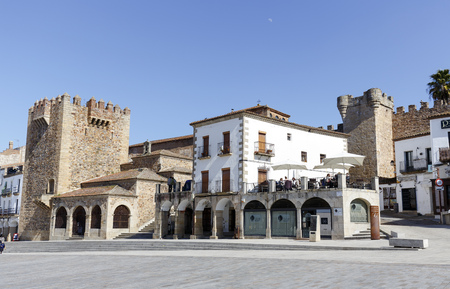 Caceres, Spain - March 16, 2016: Square of Caceres, Bujaco Tower, Chapel of Peace and bow of the Star in the Plaza Mayor.のeditorial素材